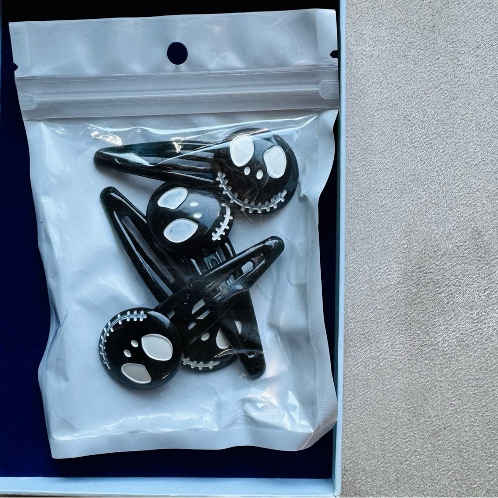 Set of 4 Jack Skellington Hair clips; Each ~2.5” long.